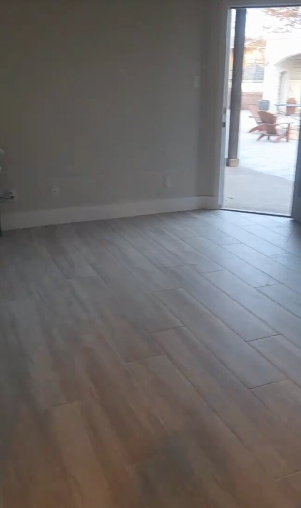 Completed wood-look tile flooring installation